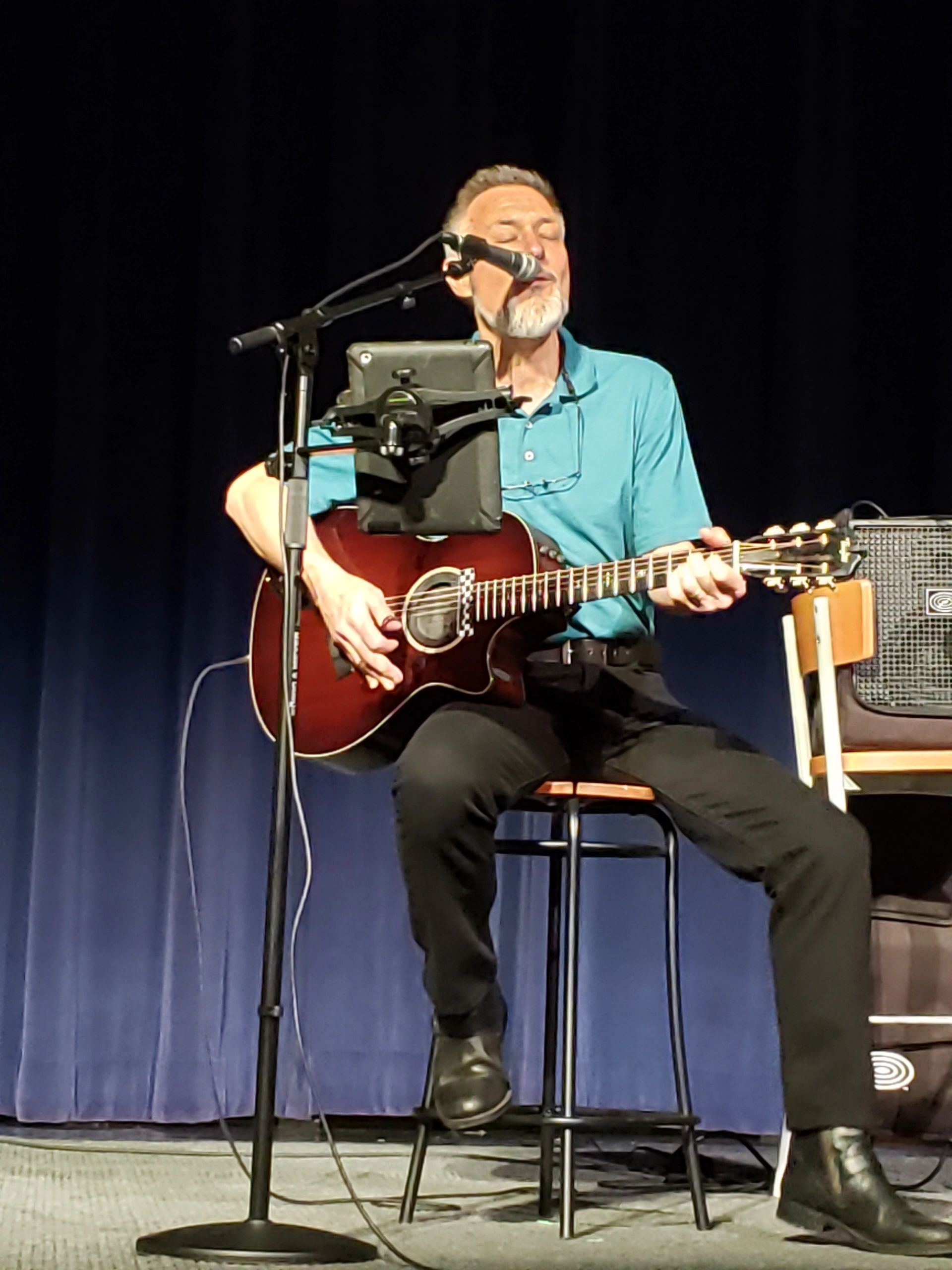 Craig Gleason performing on stage